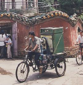 Tricycle transporteur